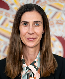 Headshot of Karly Warner and Access to Justice 2025 Conference speaker.