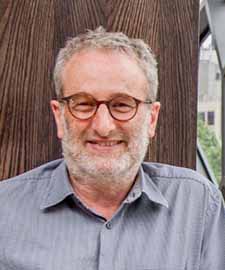 Headshot of Jon Faine AM and Access to Justice 2025 Conference speaker.